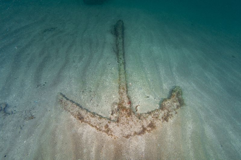 Anglin's Pier First Ledge - An old anchor lays on the sand