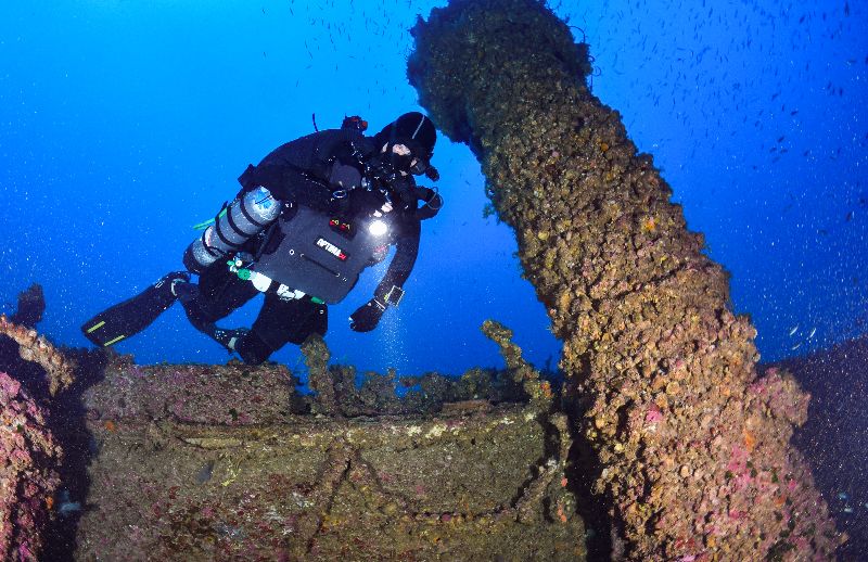 Skycliffe - A diver hovers in the stern of the wreck