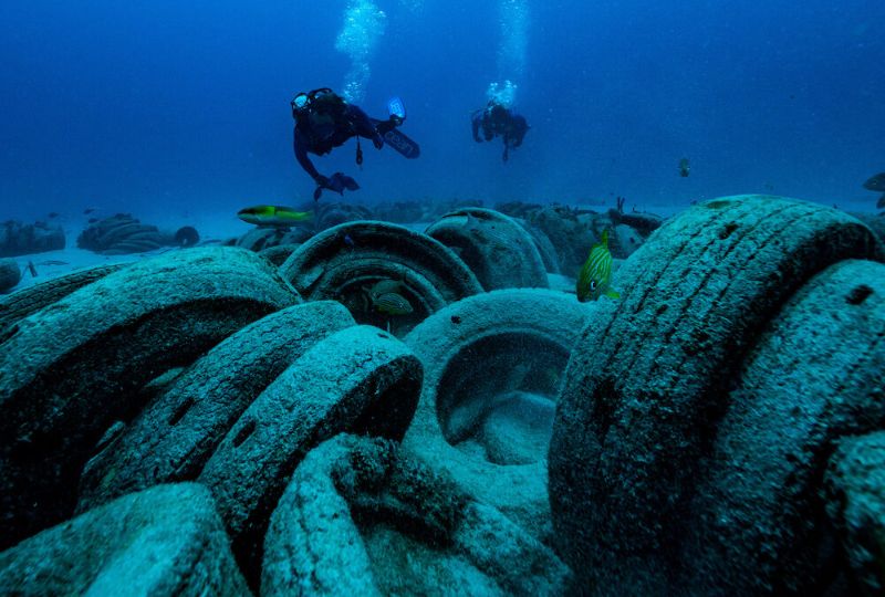 Osborne Tire Reef - Two divers exploring the artificial reef