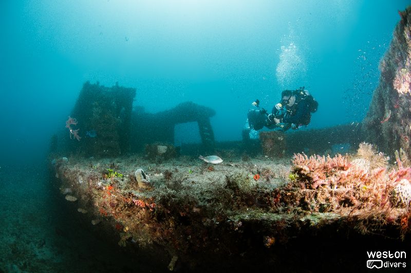 Danny McCauley - Divers hover the open wreck