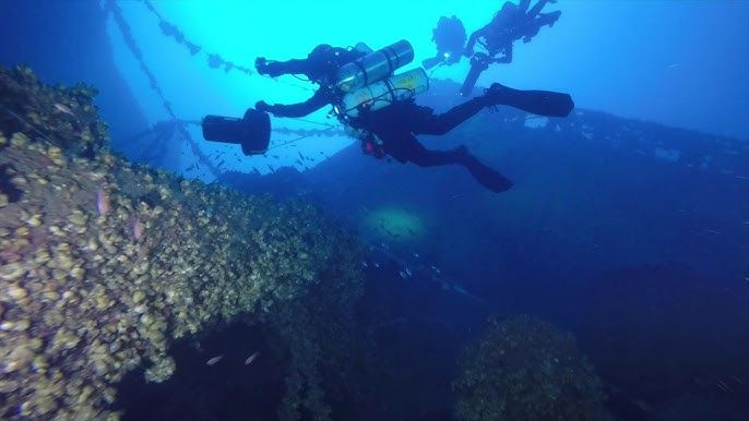 Wilkes-Barre - Technical divers use DPVs to cover a lot of ground underwater. Useful in a wreck this big