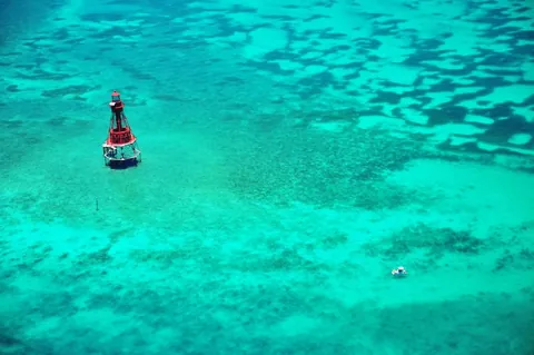 American Shoal - An aerial view of the dive site and the lighthouse